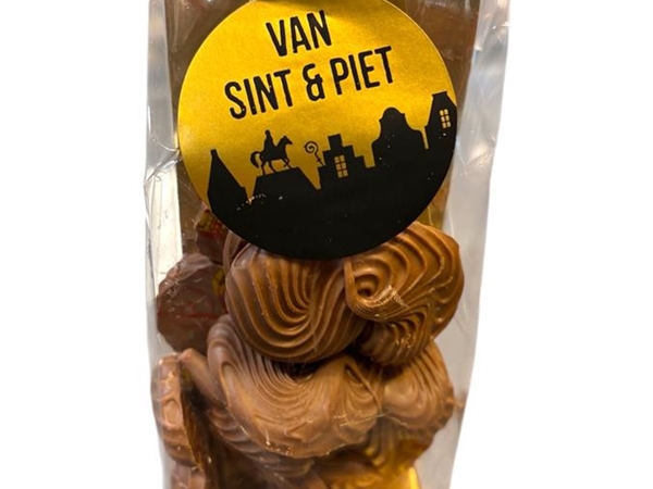 Mini letter S in gouden zakje